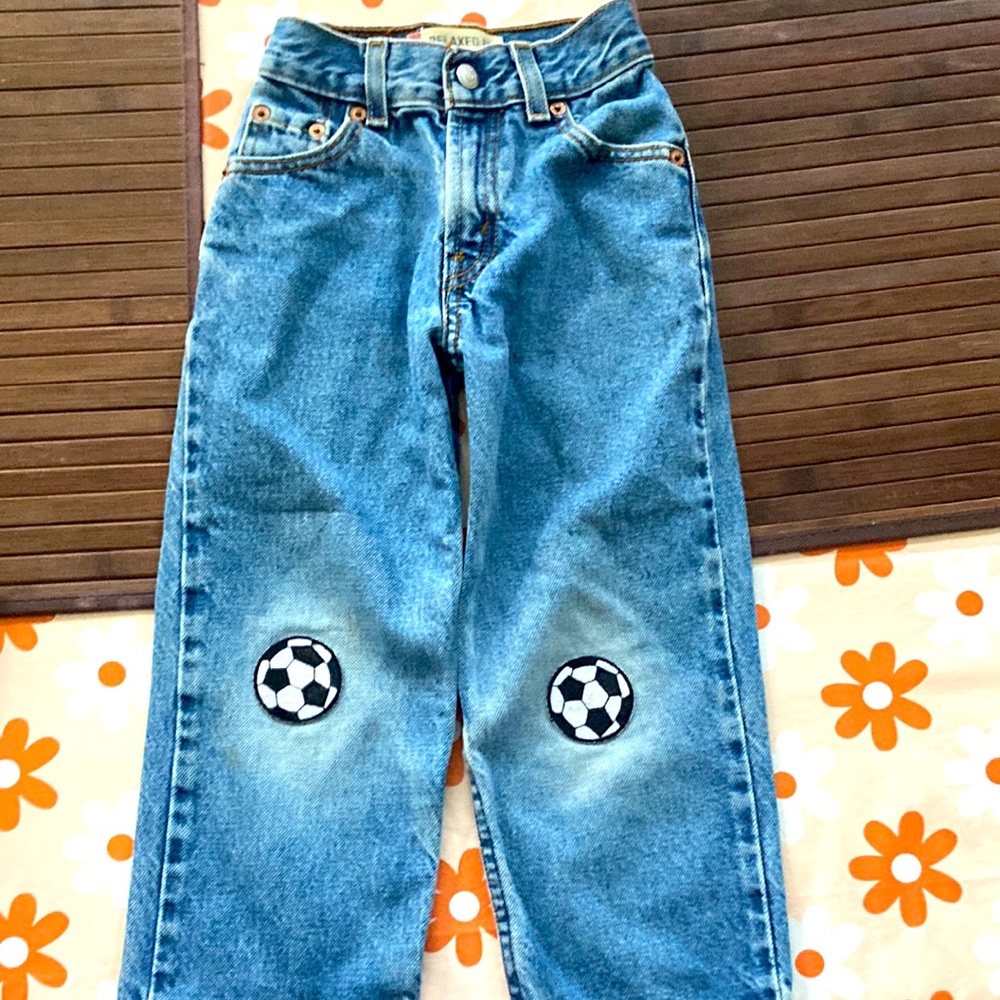 Levi’s 5 slim 550 jeans w patched knees and Marvel avengers swim trunks size 4